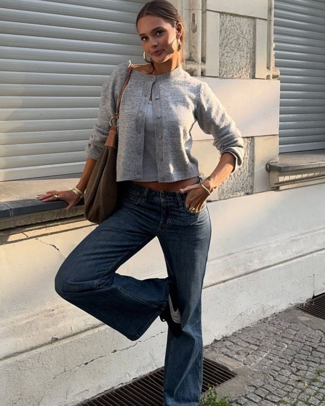 Relaxed day out outfit with grey knit cardigan and blue wide leg jeans