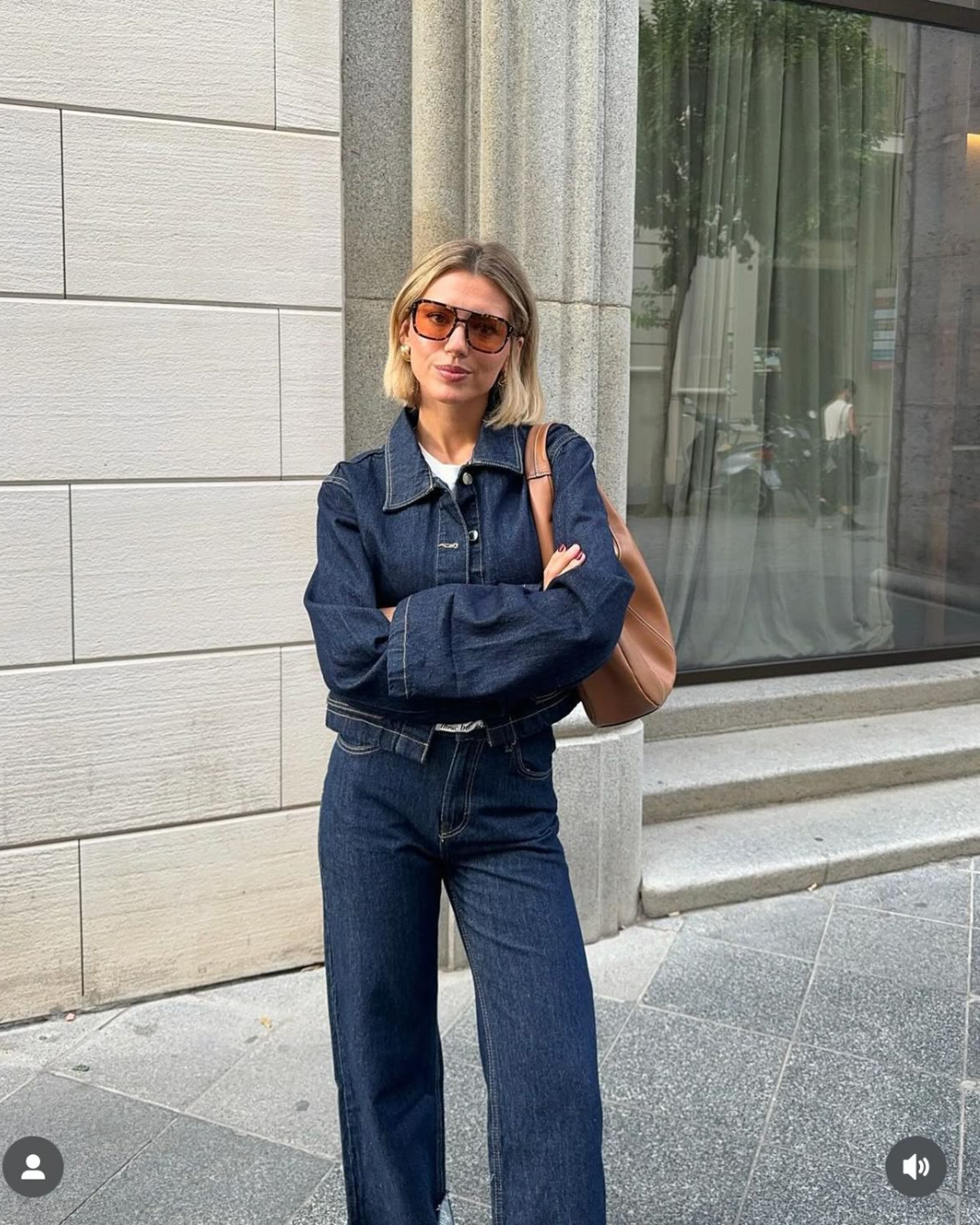Modern denim on denim outfit with structured jean jacket and wide leg jeans